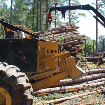 Forestry equipment at work in woodlot with VCI corrosion prevention